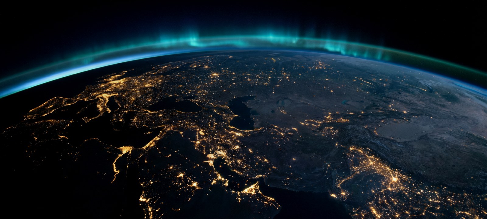 Cities at night seen from orbit — a global ambient IoT canvas